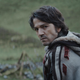Cassian Andor looks back over his shoulder.